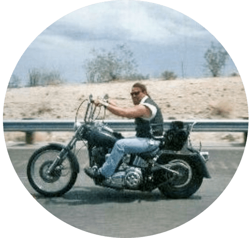 Photo of Matthew McClellan on a motorcycle